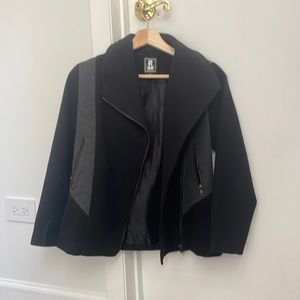 A black and grey jacket. Never worn